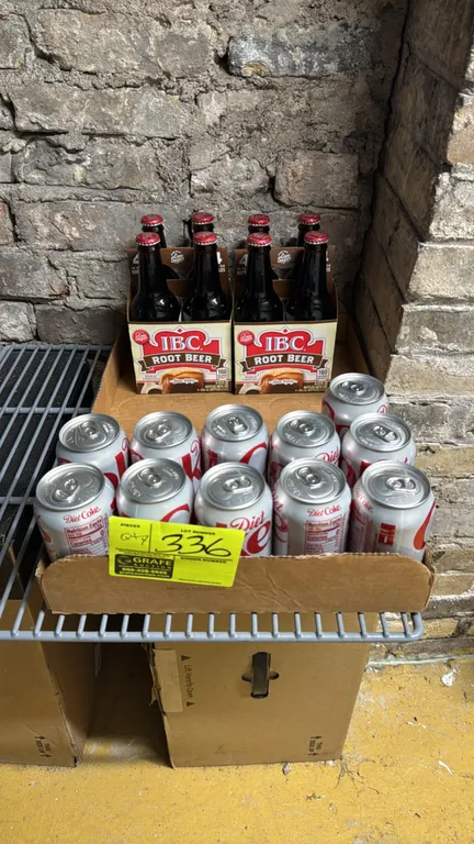 Diet Coke and IBC Root Beer beverage package lot. Includes (2) 4-packs of IBC Root Beer (12 fl oz glass bottles, 8 bottles total) and a partial case o