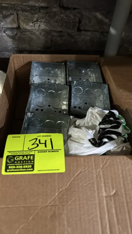 Bulk lot of metal electrical junction boxes. Features galvanized steel construction with integrated conduit knockouts.