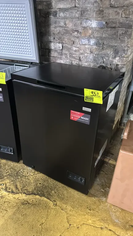 2024 Frigidaire Gallery FGFRF5009-BLACK chest freezer. Features garage-ready design, black finish, front mechanical temperature control dial with powe