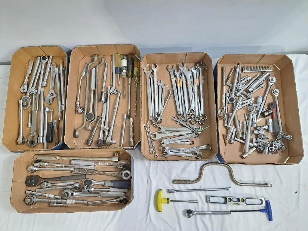 Large assortment of ratchets, sockets, metric
