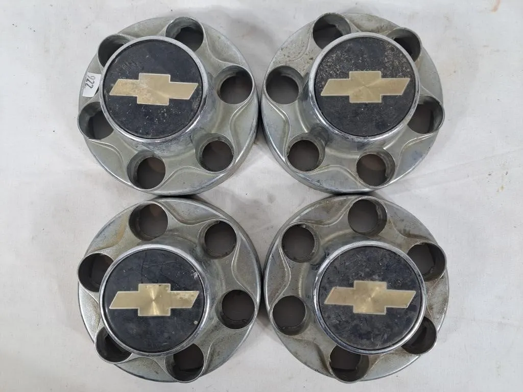 Four Chevrolet Hub Caps