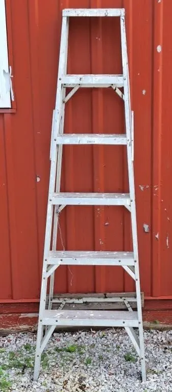 5 step aluminum ladder. Has been repaired