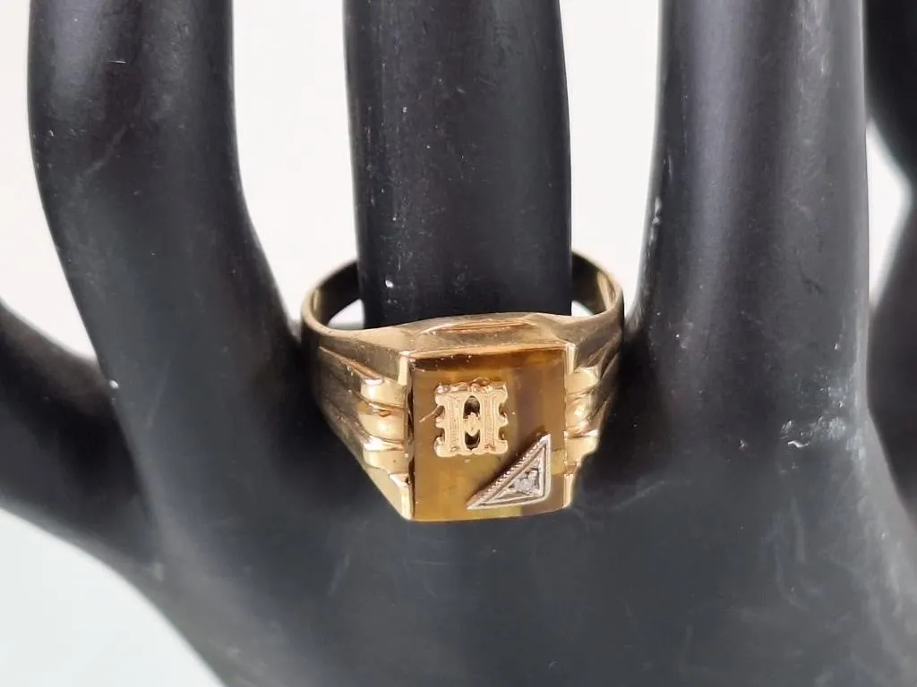 10K Tigers Eye Signet ring with 1 tested diamond.