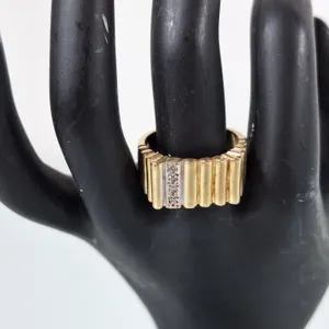 10K Ring with 4 tested diamonds. Size 9