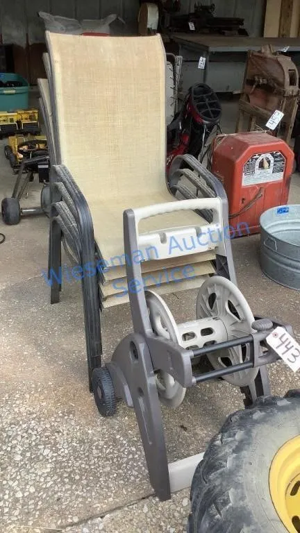 GARDEN HOSE REEL AND FOUR PATIO CHAIRS
