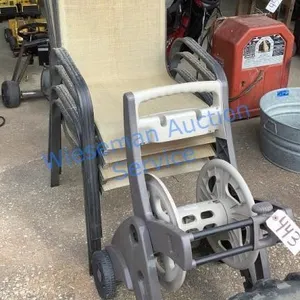 GARDEN HOSE REEL AND FOUR PATIO CHAIRS