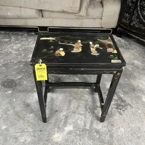 ORIENTAL END TABLE WITH RAISED FIGURES
