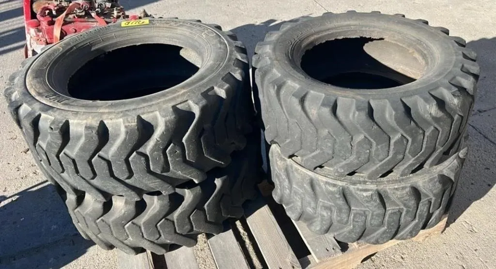 Set a 4 UNIROYAL 10-16.5 NHS Skid Steer Tires.