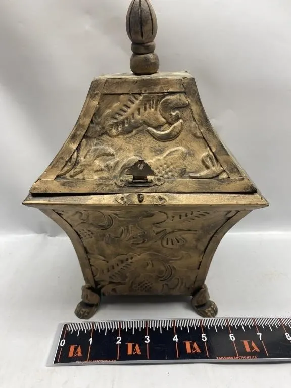 Ornate brass-tone lidded footed box with claw feet