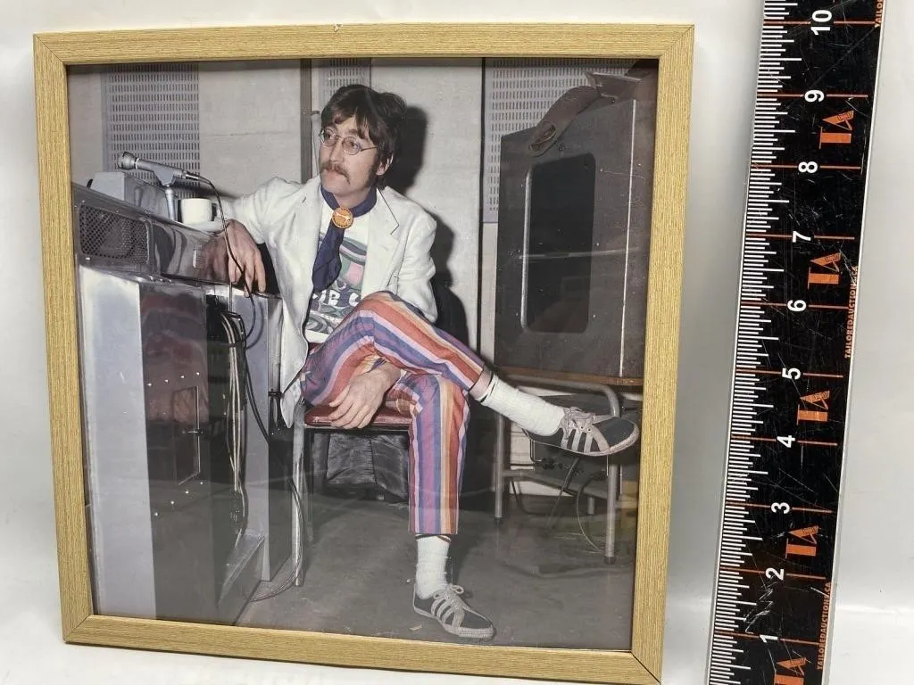 Framed photo of John Lennon in recording studio
