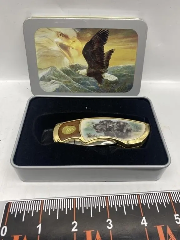 Folding pocket knife with wildlife design in tin