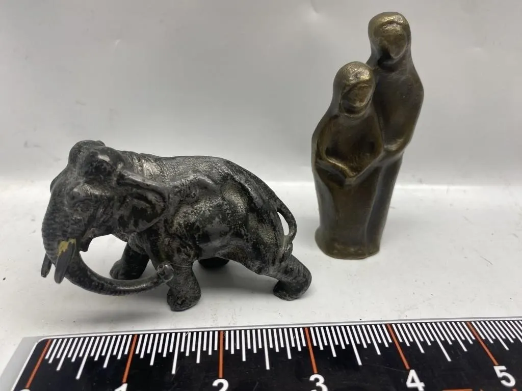 Bronze elephant figurine and abstract figures