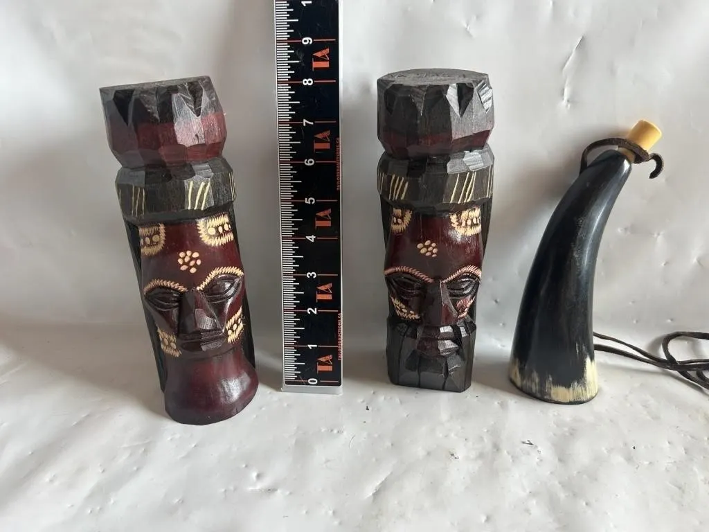 Pair carved wood tiki figures & horn-shaped bottle