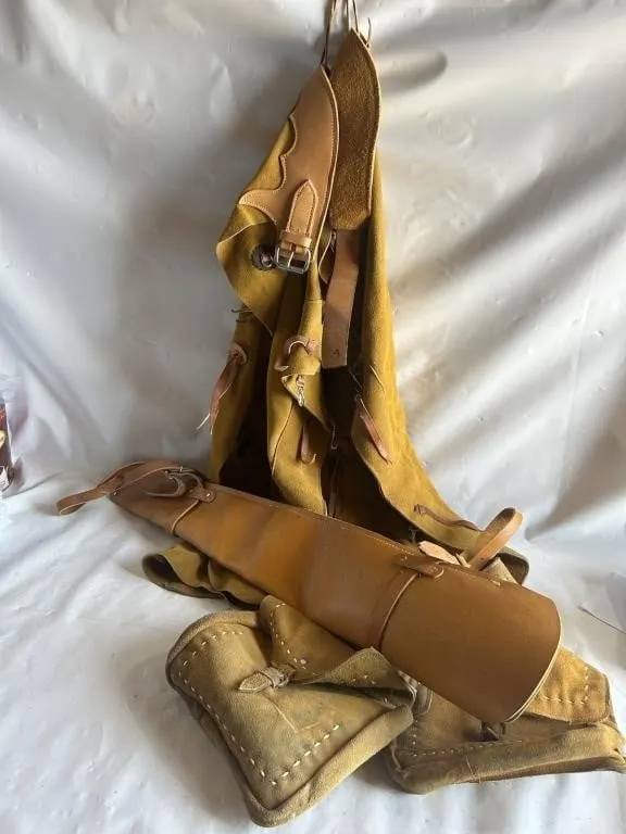 Leather saddlebags, gun scabbard, and chaps