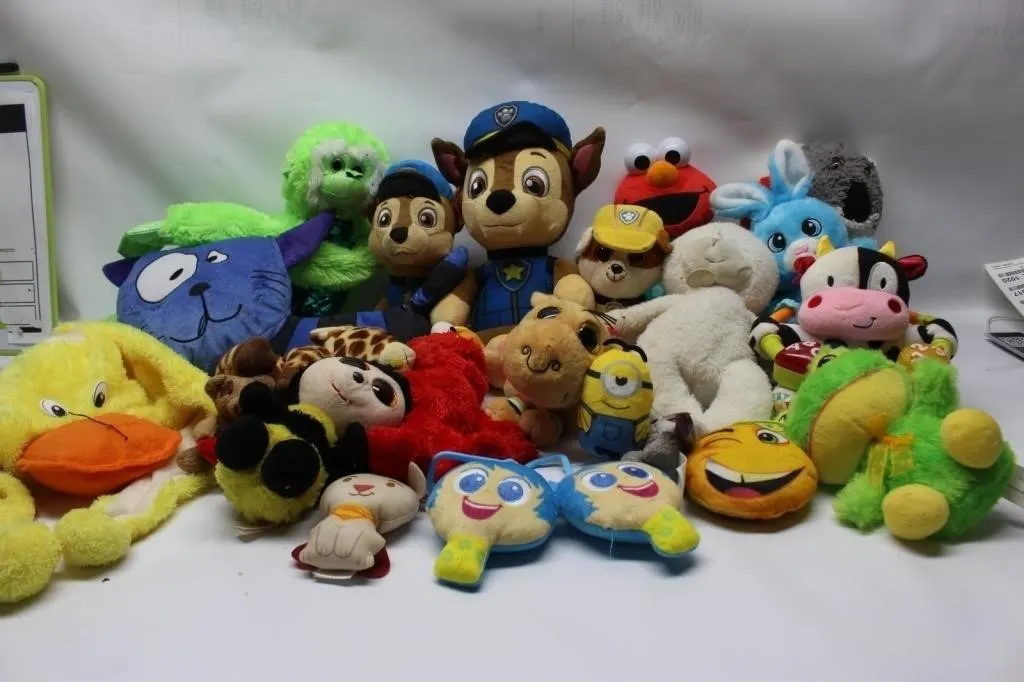 Assorted plush toy lot: Paw Patrol, Elmo, animals