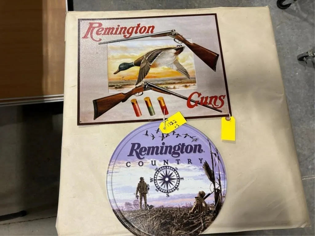 2 Remington Tin Signs