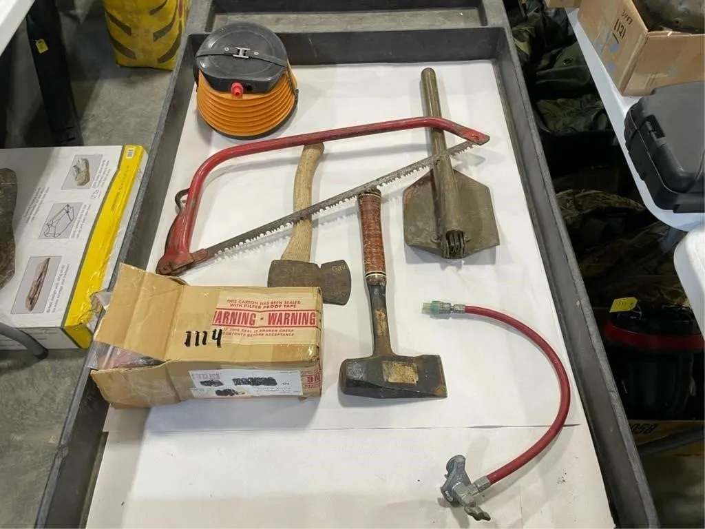 Saw, Shovel, Tent Stakes