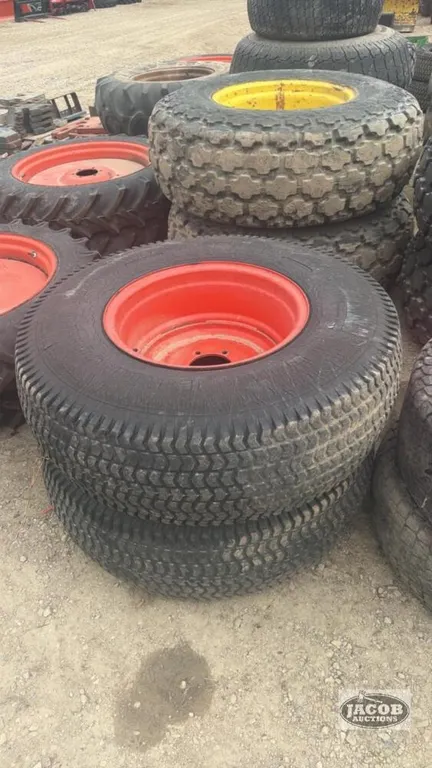 Pair of 355/80-20 tires on Kubota 6 bolt wheels