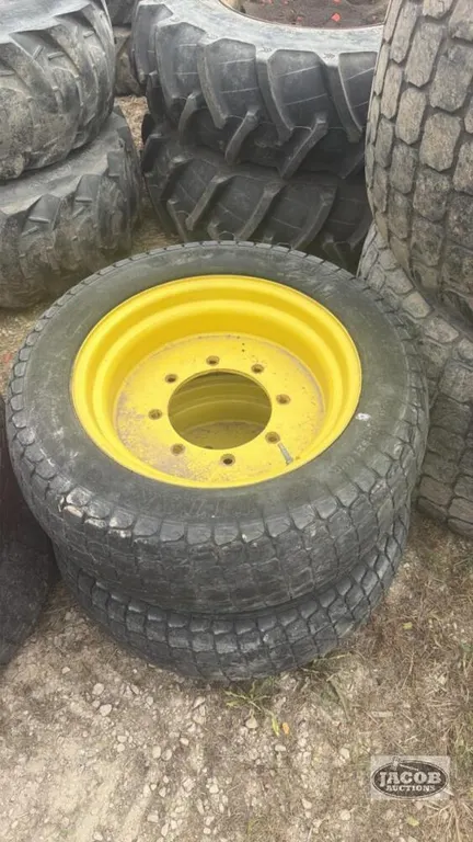 Pair of 305-521 tires on Jd 8 bolt wheels