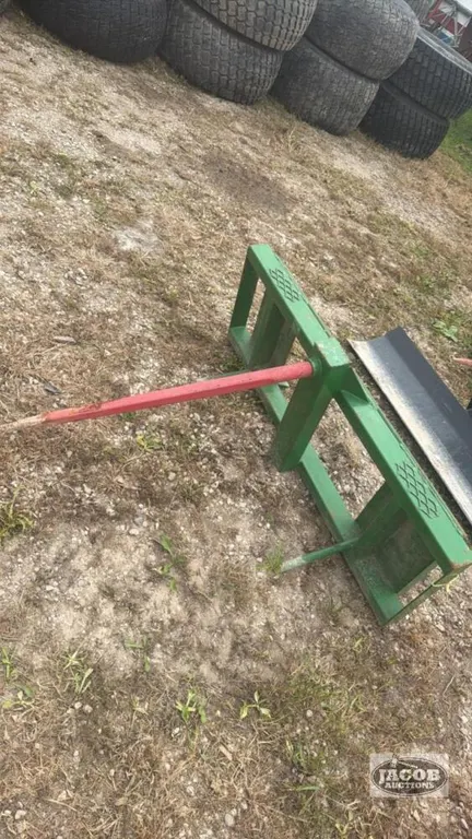 Unused skid steer quick tach bale spear