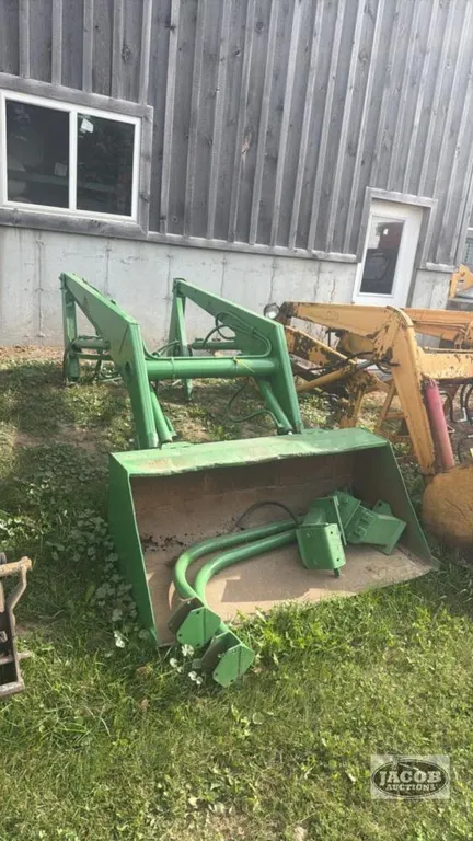 John Deere loader with brackets