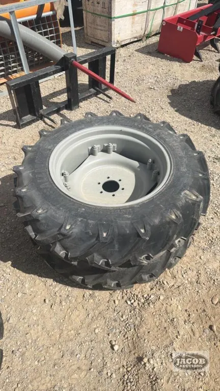 Unused ALliance 11.2 24 tire on 6 bolt wheel x2