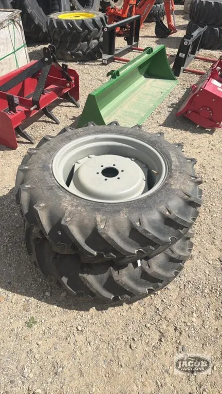 Unused ALliance 11.2 24 tire on 6 bolt wheel x2