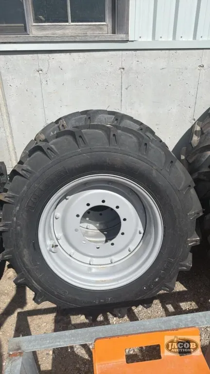 Unused 14.9 -28 rim tire combo x2