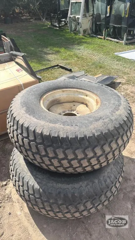 Pair of 44x18.00-20 tires on Newholland 8 bolt wheels
