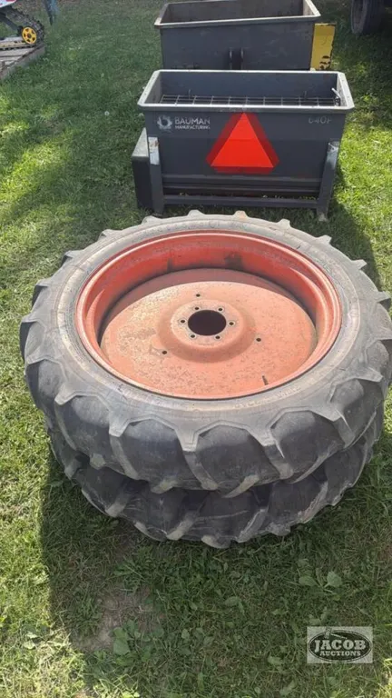 Pair of 9.5 -32 tires on Kubota 6 bolt wheels