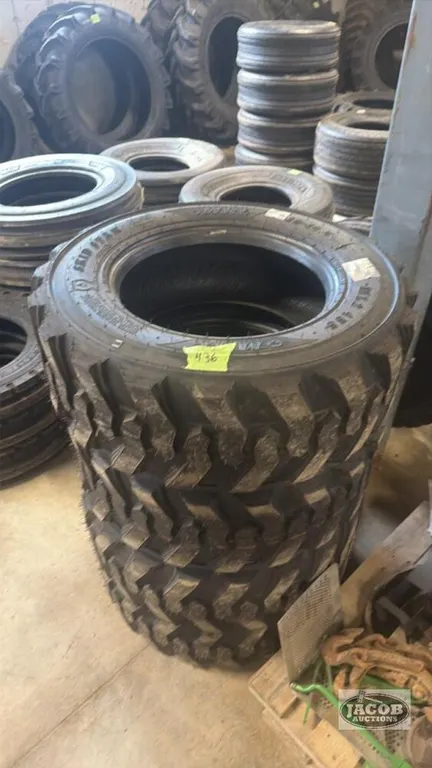 Unsued 10-16.5 skid steer tire x4
