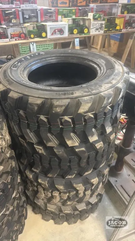 Unused 12-16.5 skid steer tire 12ply x4