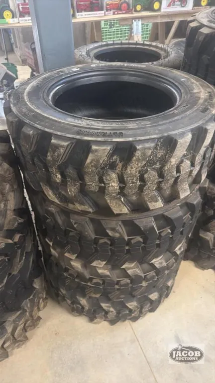 Unused 10-16.5 skid steer tire 10ply x4