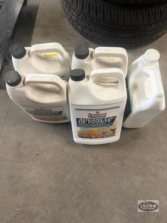 5 jugs of wood protector