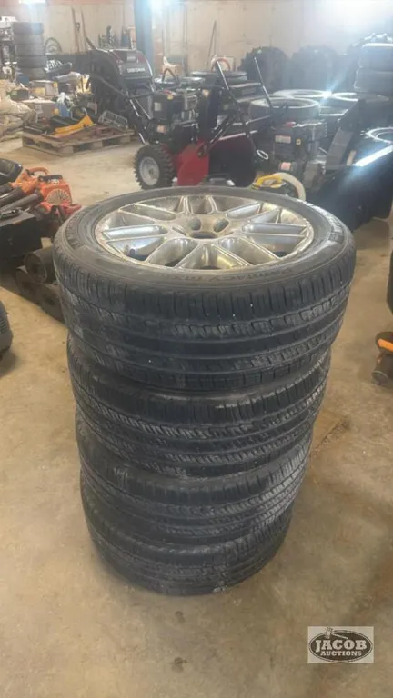 Set of 4 tires p235/50R18 on 5 bolt wheels