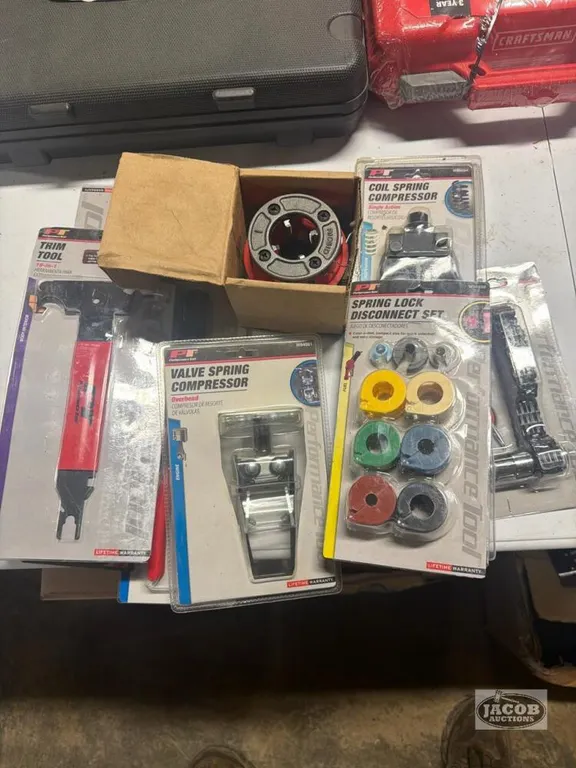 Pipe threader , coil spring compressor, filter wrench , flare tool , misc