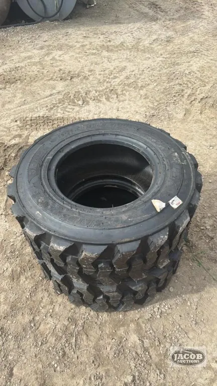 Unsued 12-16.5 skid steer tire x2
