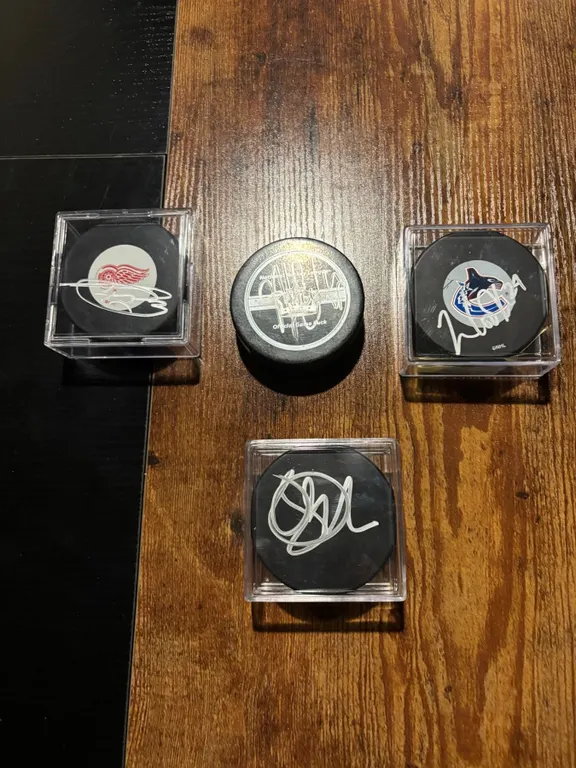 4 Autographed NHL Hockey Pucks