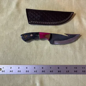 Damascus steel knife with gut hook