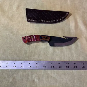 Damascus steel knife with gut hook