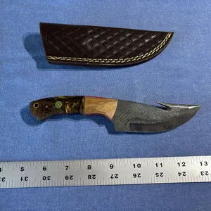 Damascus steel knife with gut hook