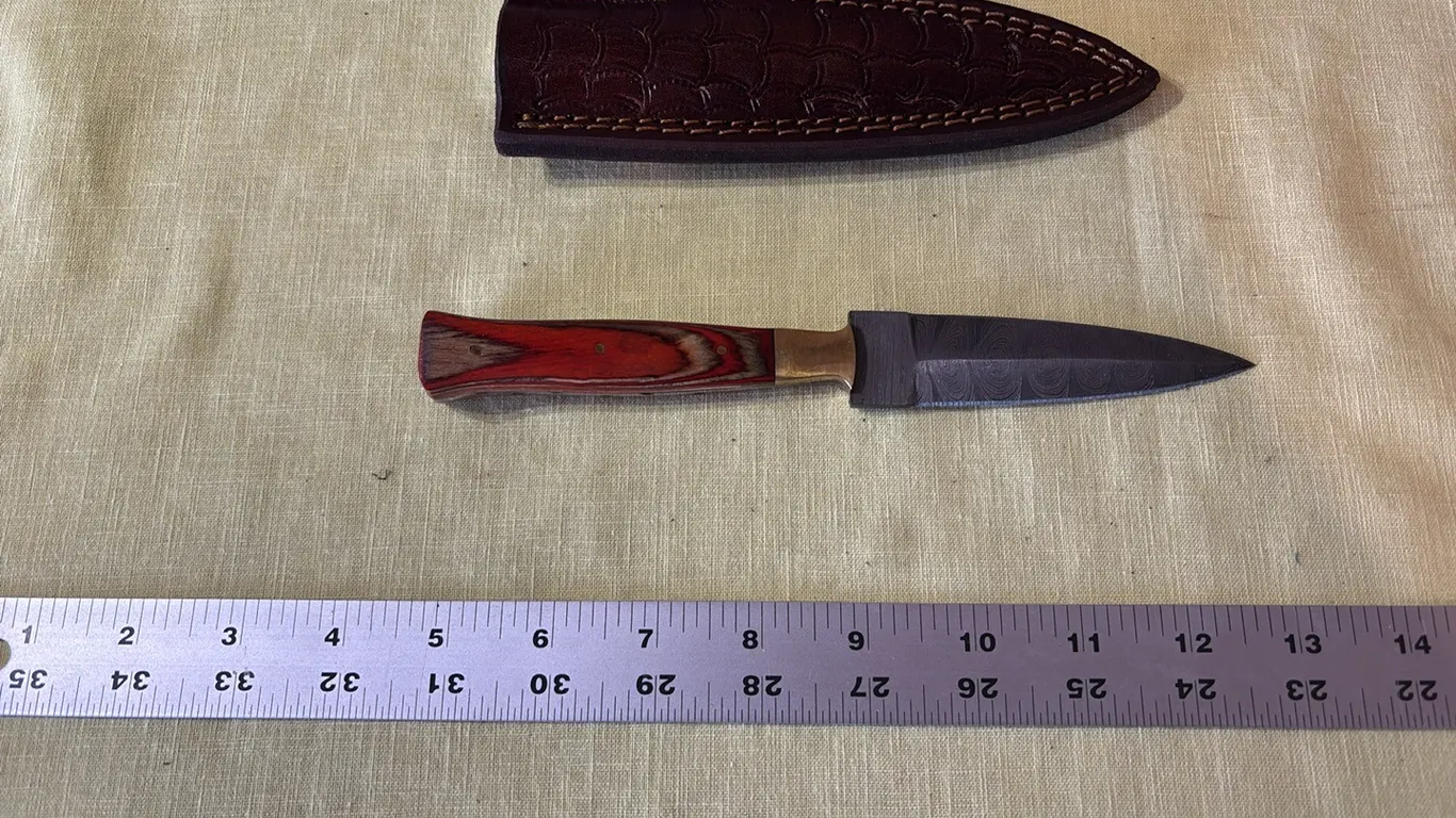 Damascus steel double edged knife