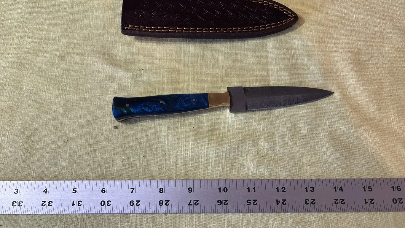 Damascus steel double edged knife