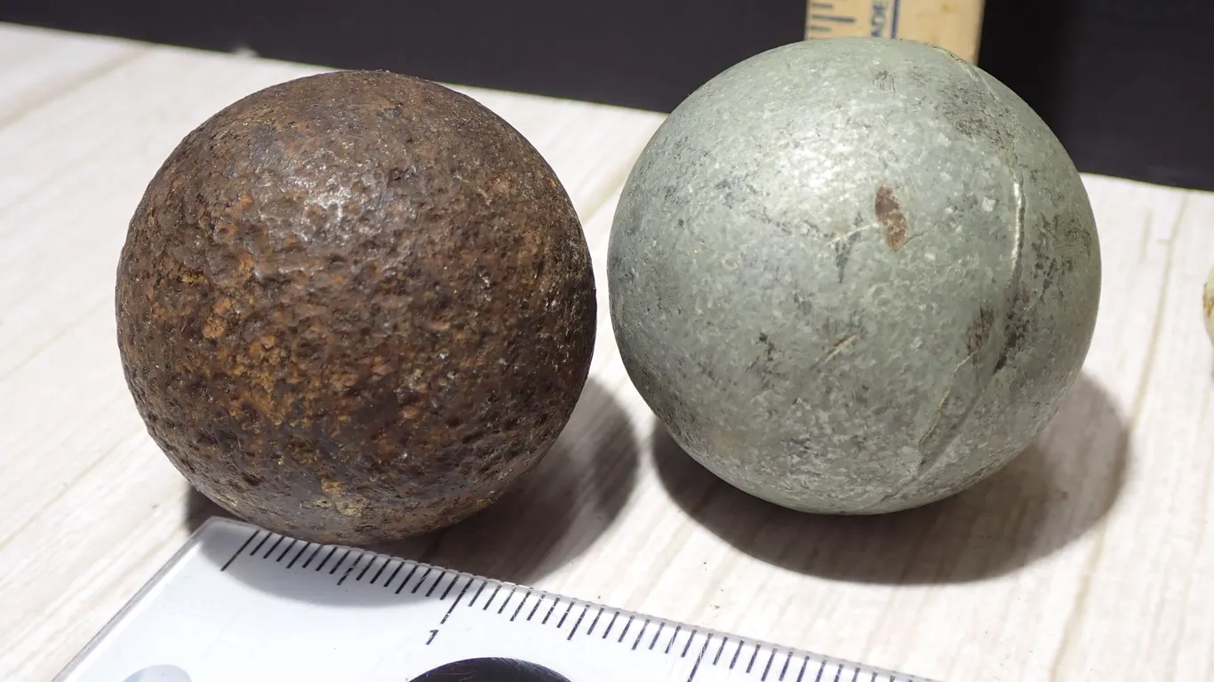 Pair of Antique Cast Iron Cannonballs One Ohio Dug Grapeshot One Unfired Mold Seam Shot