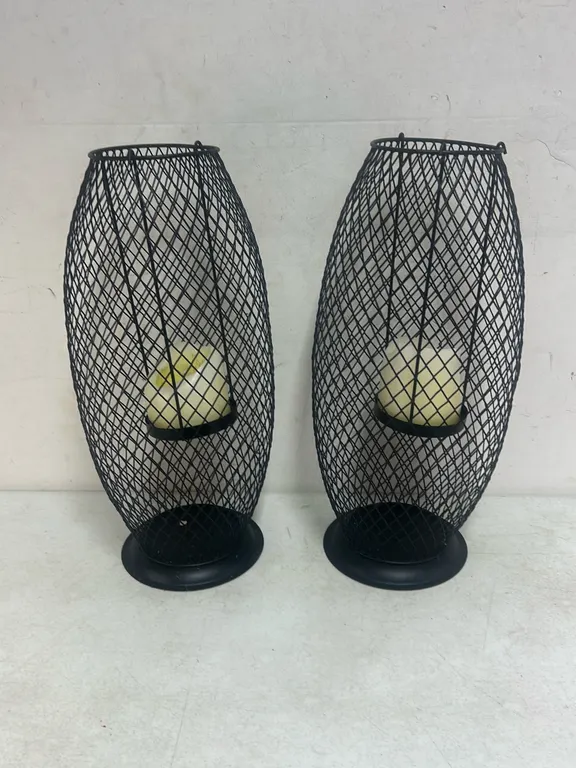 2 FLOOR CANDLE HOLDERS