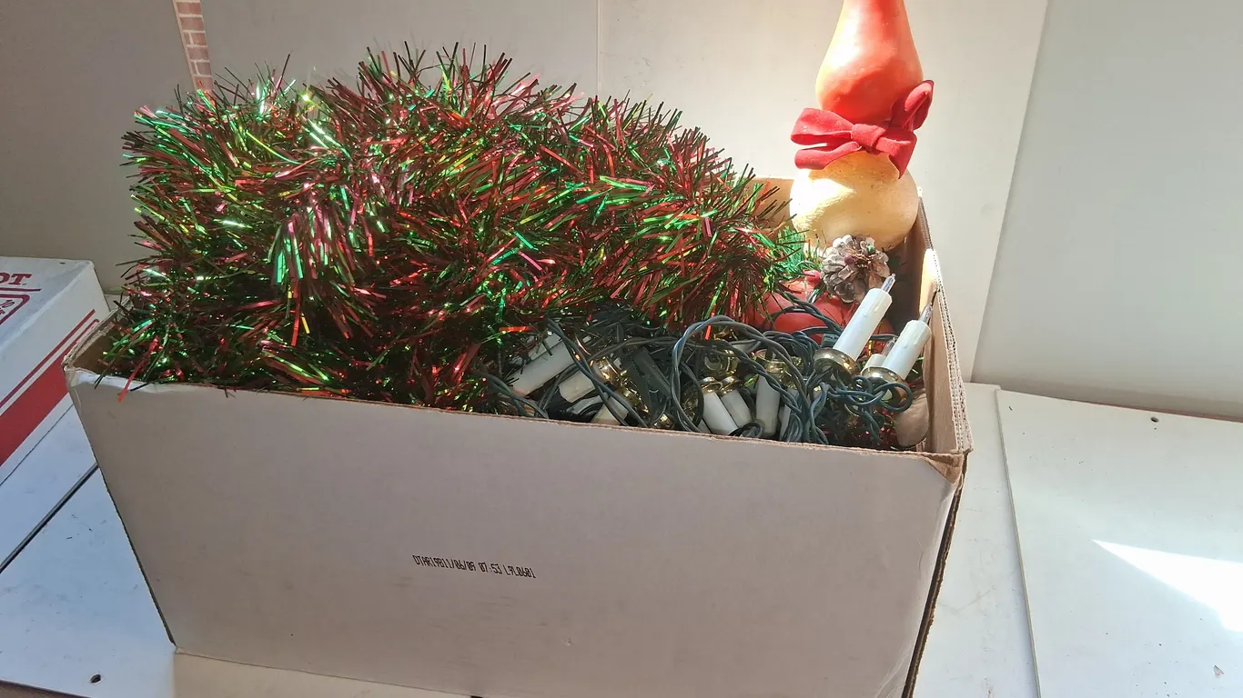 Christmas Tinsel Lights and Candle