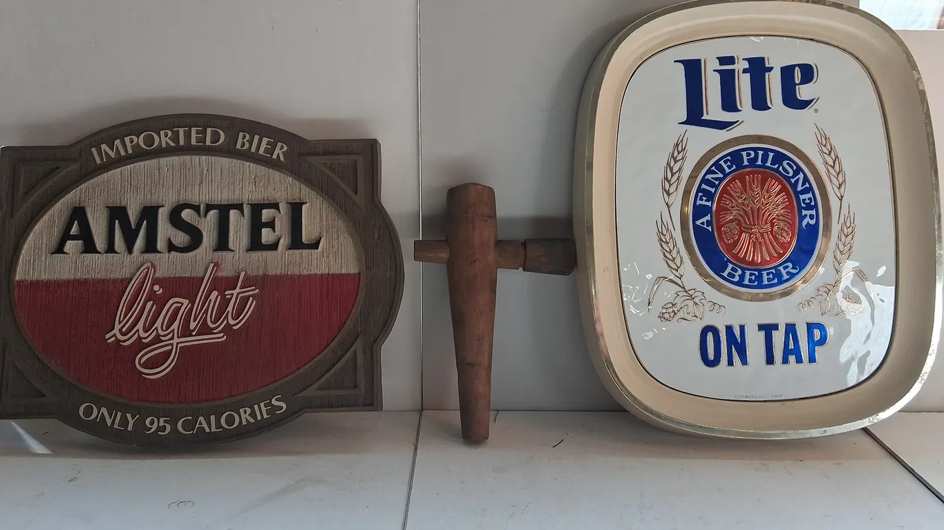 Vintage Plastic Beer Signs and wooden Keg Tap