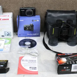 Canon PowerShot Cameras, Bushnell Binoculars, Tools