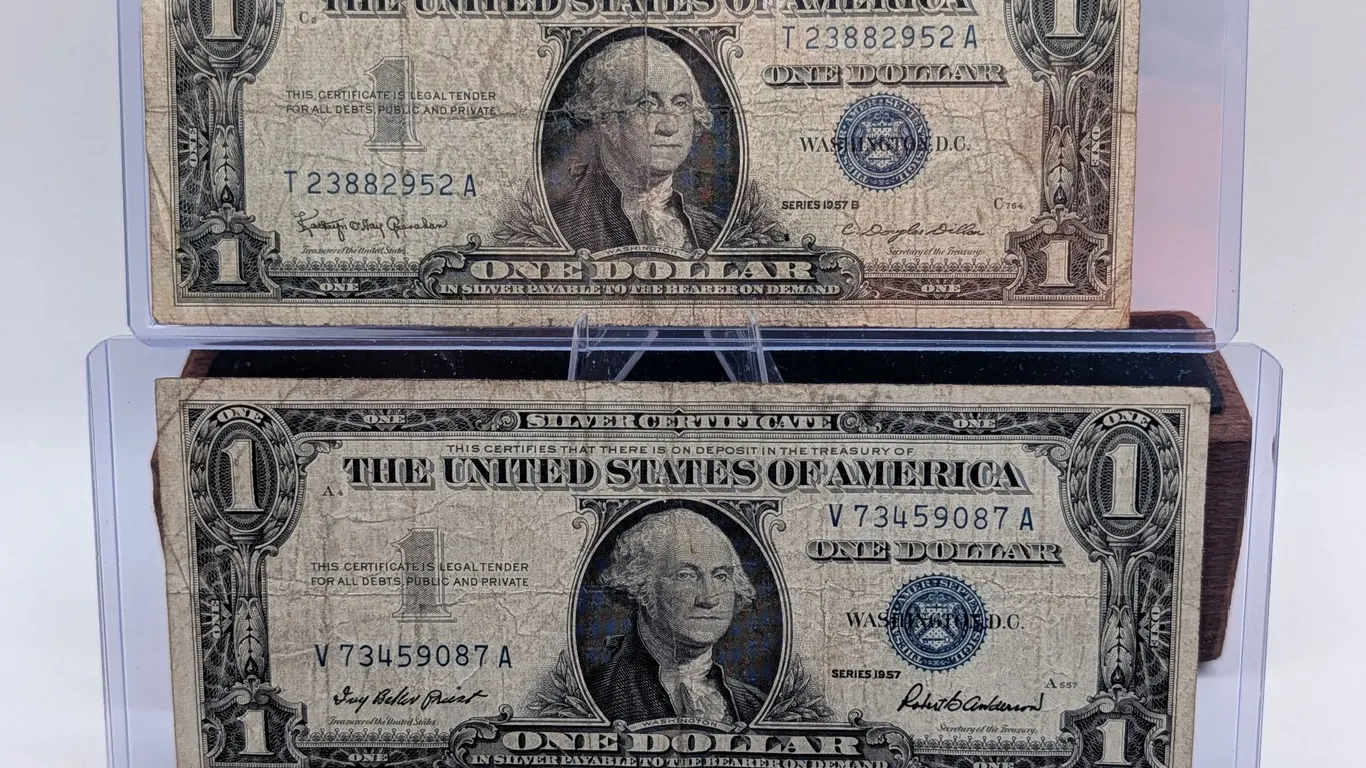 $1 Silver Certificate Lot – Series 1957 & 1957B Blue Seals – Circulated Duo – In Protective Sleeves