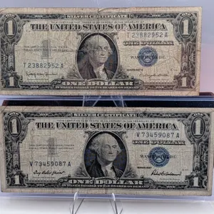 $1 Silver Certificate Lot – Series 1957 & 1957B Blue Seals – Circulated Duo – In Protective Sleeves